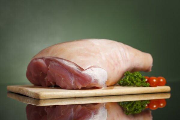 Raw,Pork,Leg,On,Wooden,Cutting,Board,Ready,For,Cooking