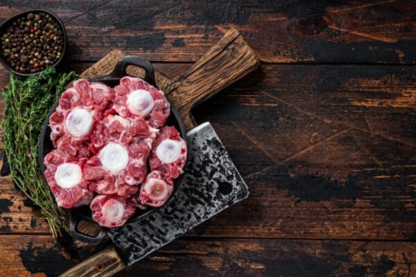 Raw,Veal,Beef,Oxtail,Meat,On,Butcher,Wooden,Board,With